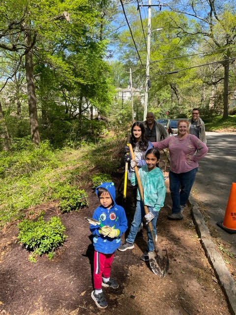 Volunteers hard at work beautifying Dearborn Park.